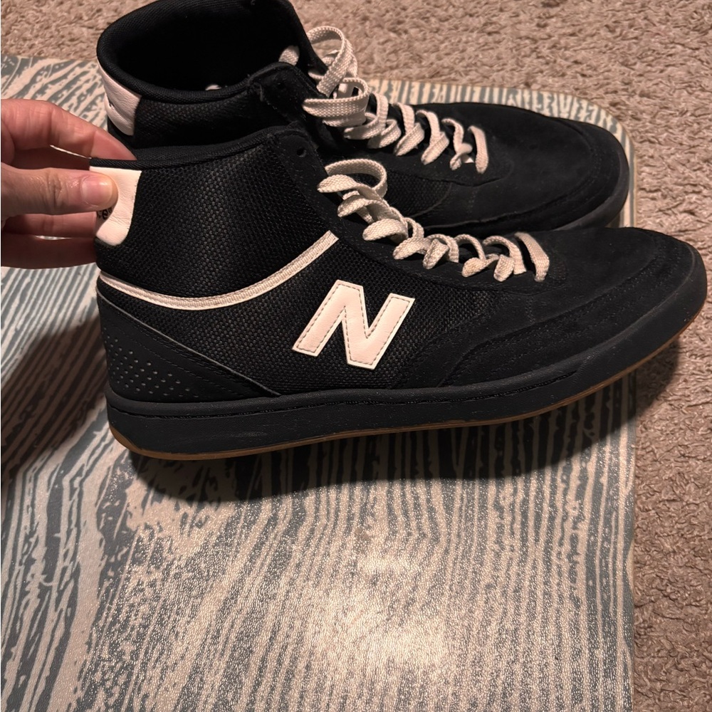 New Balance Black and White High-Top Sneakers